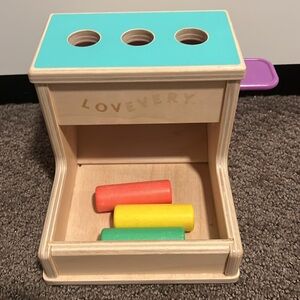 Lovevery Think Kit Peg drop dowel drop toy